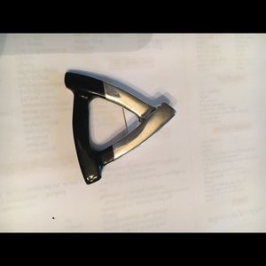 Silver and black brooch